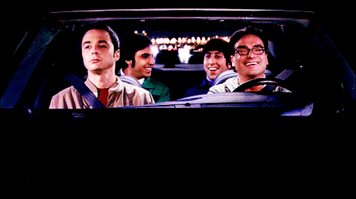 Four people travelling in a car at night